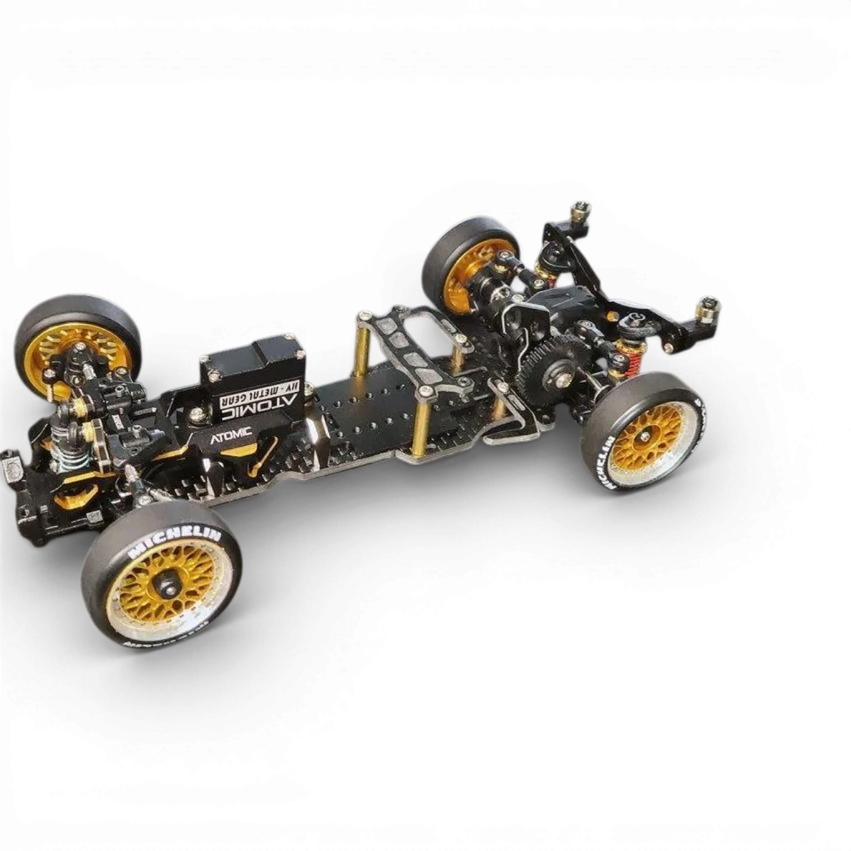 Châssis de drift RC DRZV3MS RWD de la marque Atomic RC Mini, vue de face avec composants de la kit de drift.