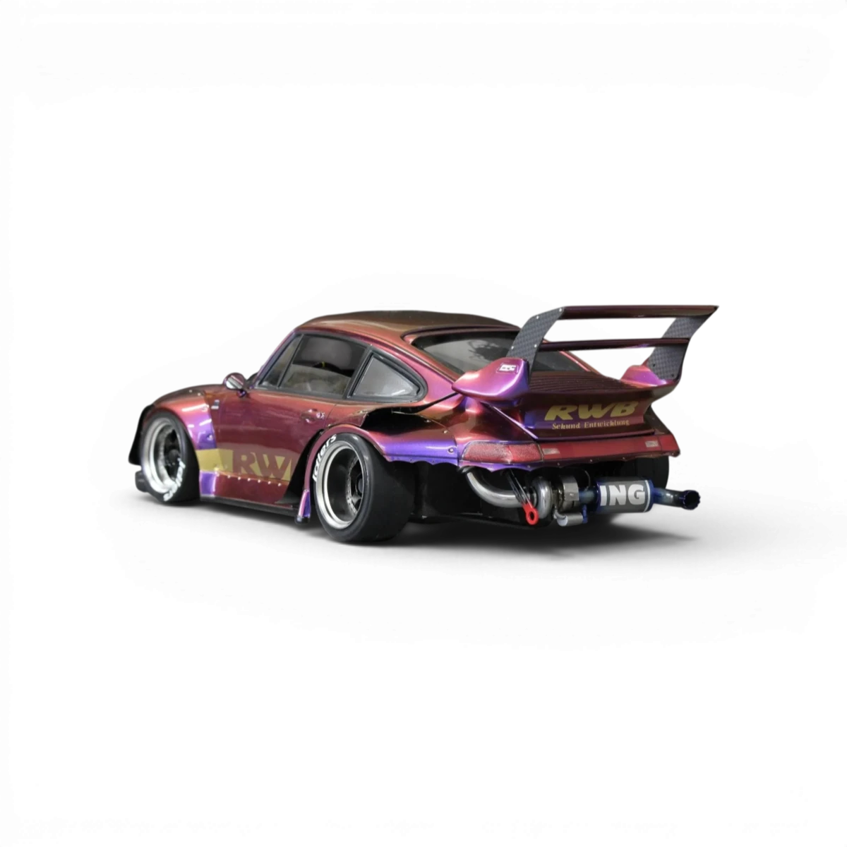 Echappement RWB Rotana Pandora RC pour personnalisation de voiture, avec finition en métal noir et détails de marque.