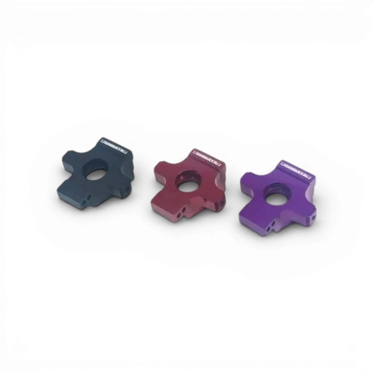 Ensemble de fusées arrière en aluminium avec offset pour pièces détachées SHIBATA, montées sur une surface noire.