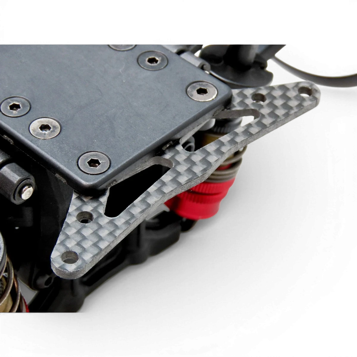 Extension de pare-chocs en carbone RDX par Wrap-UP Next, finition légère et résistante pour amélioration esthétique et protection.