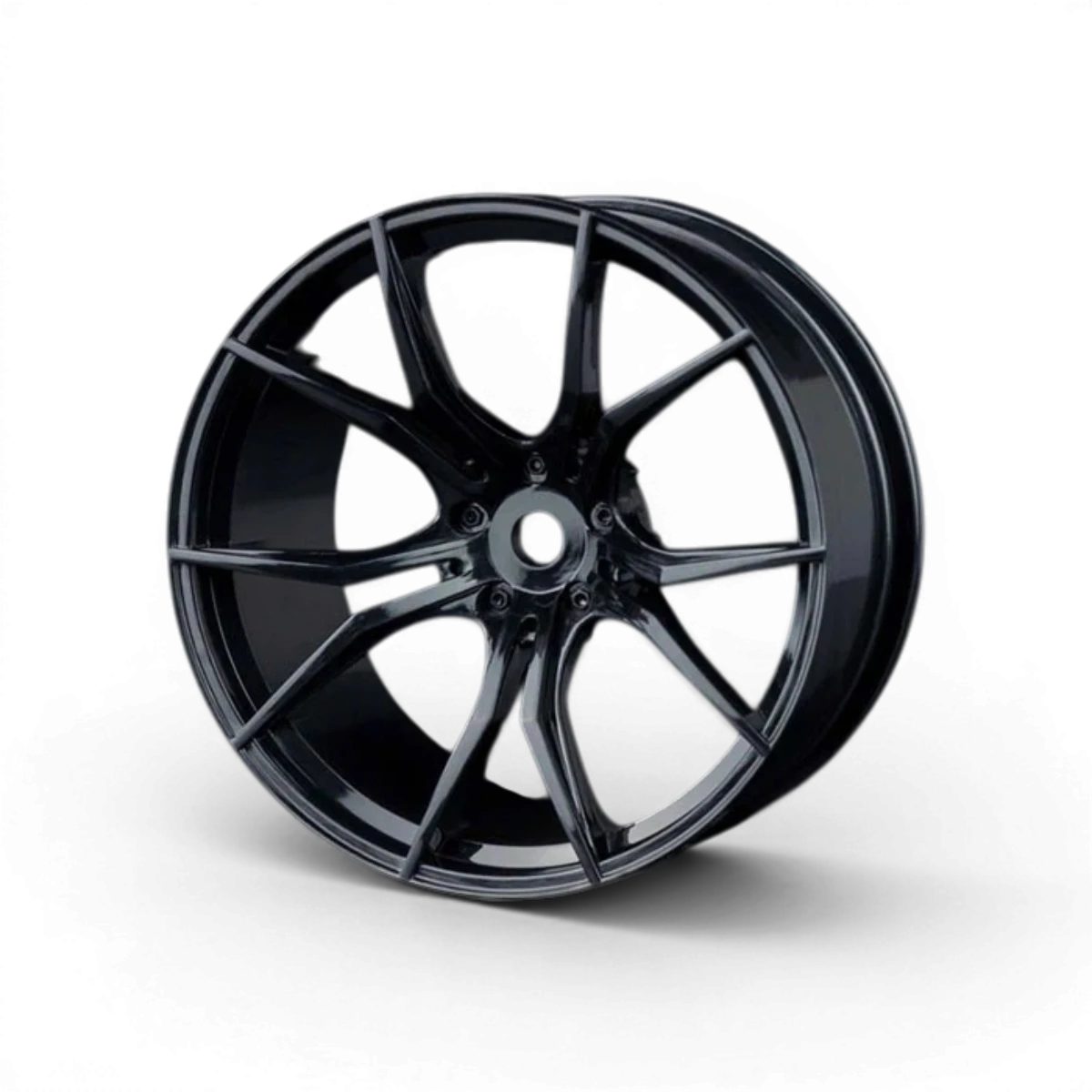 Jantes FX+5 noires de Max Speed Technology, roues en alliage avec design élégant, visibles sur l'image.