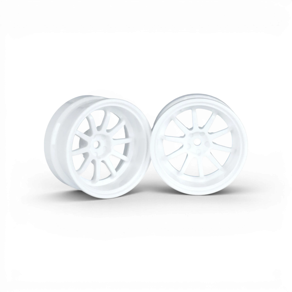 Jantes VR10 blanches de 10mm d'offset pour roues, marque Team Reve D, affichées en gros plan.