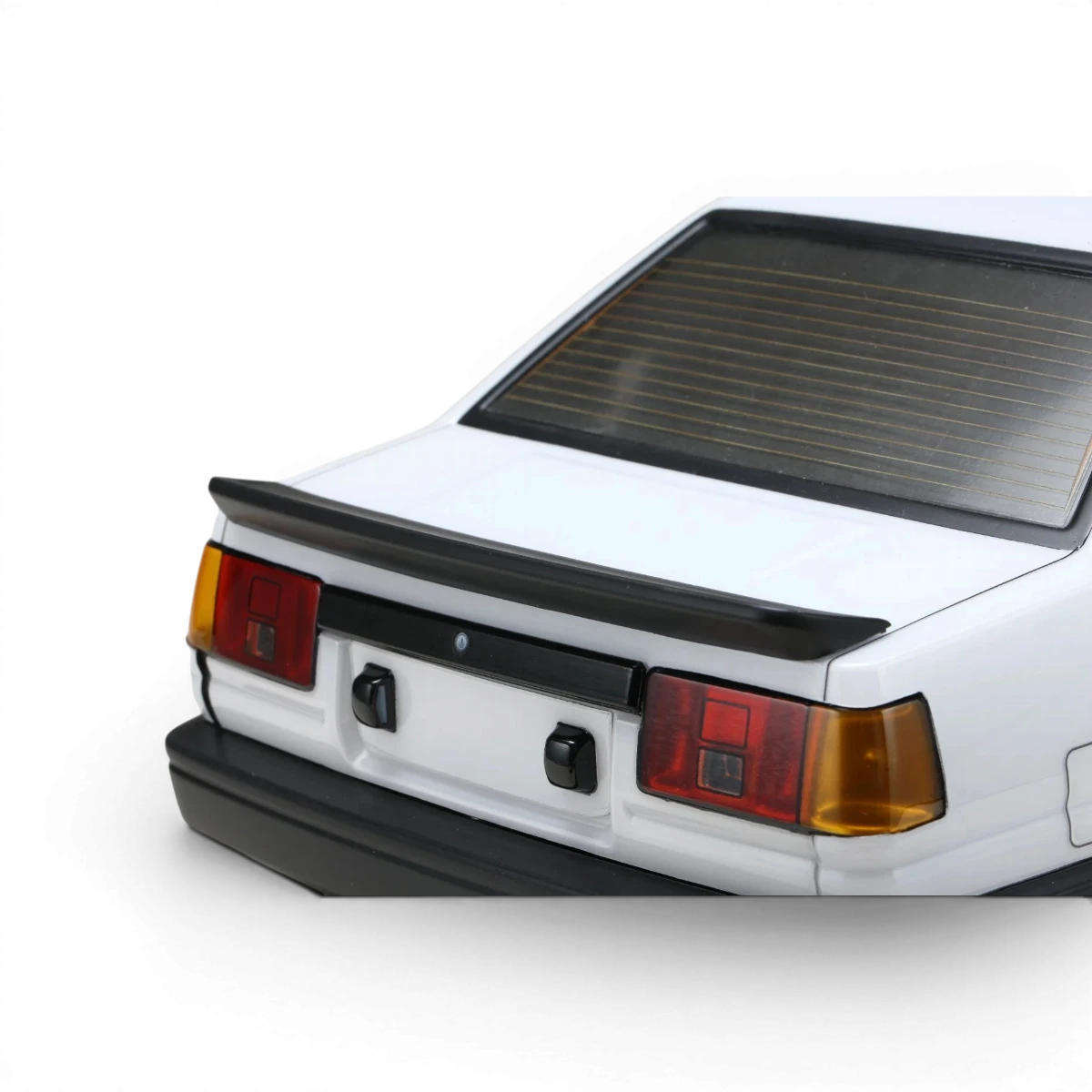 Kit de carrosserie aéro pour Toyota Corolla AE86 Levin 2 portes, marque Team Yokomo, visible en détail sur l'image.