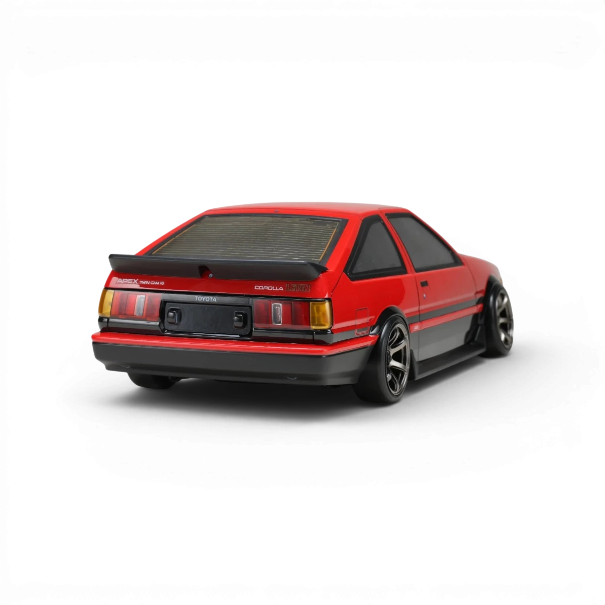 Kit de carrosserie aérodynamique pour Toyota Corolla AE86 Levin 3 portes, marque Team Yokomo, visible dans l'image.