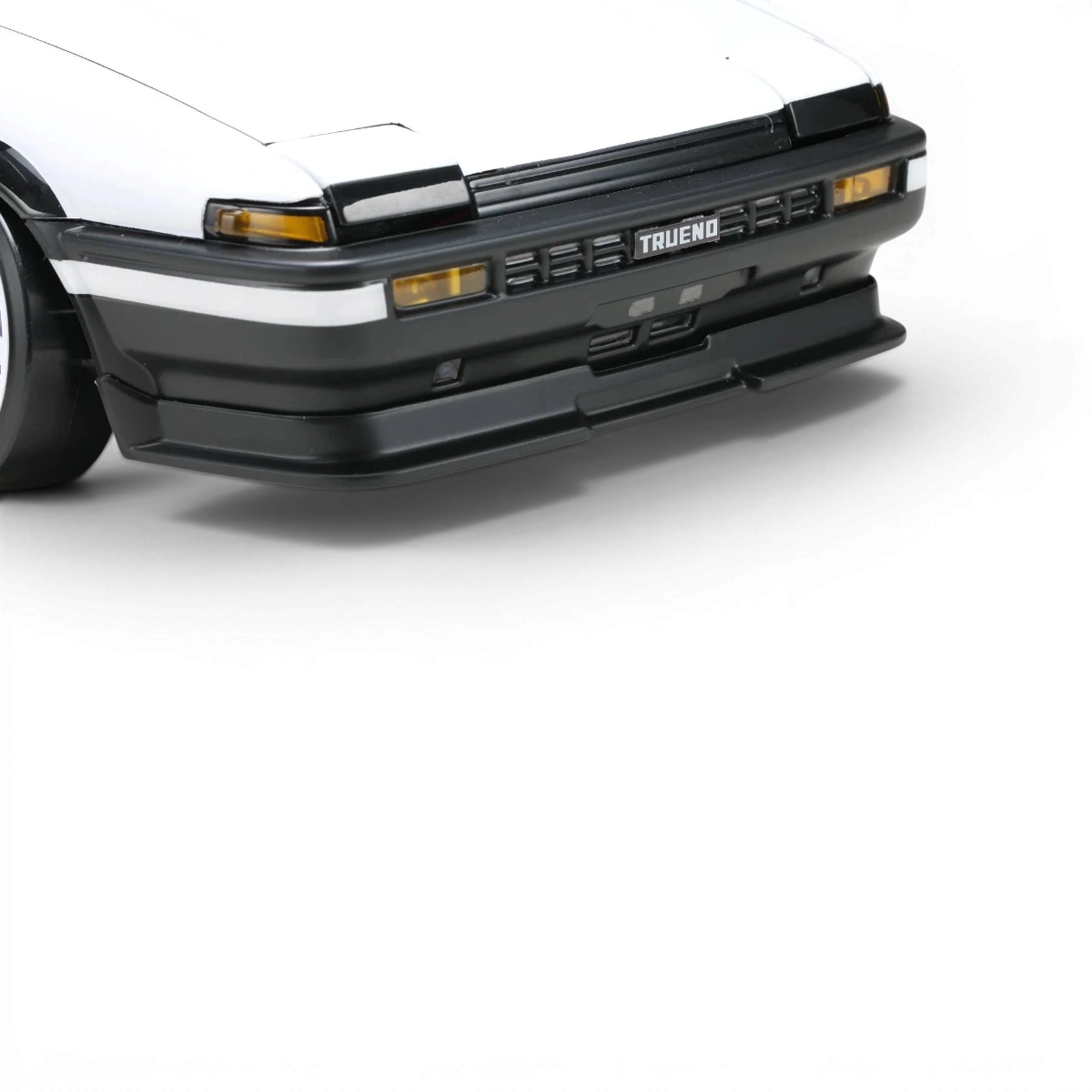 Kit de carrosserie aéro pour Toyota Sprinter AE86 Trueno 3 portes, marque Team Yokomo, visible en détail.