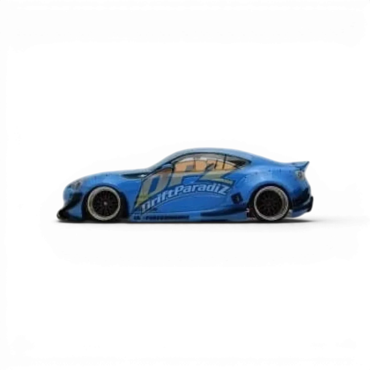 Kit de carrosserie Rocket Bunny V2 complet pour Toyota GT86 par Addiction RC Design, visible avec ailes et pare-chocs distinctifs.