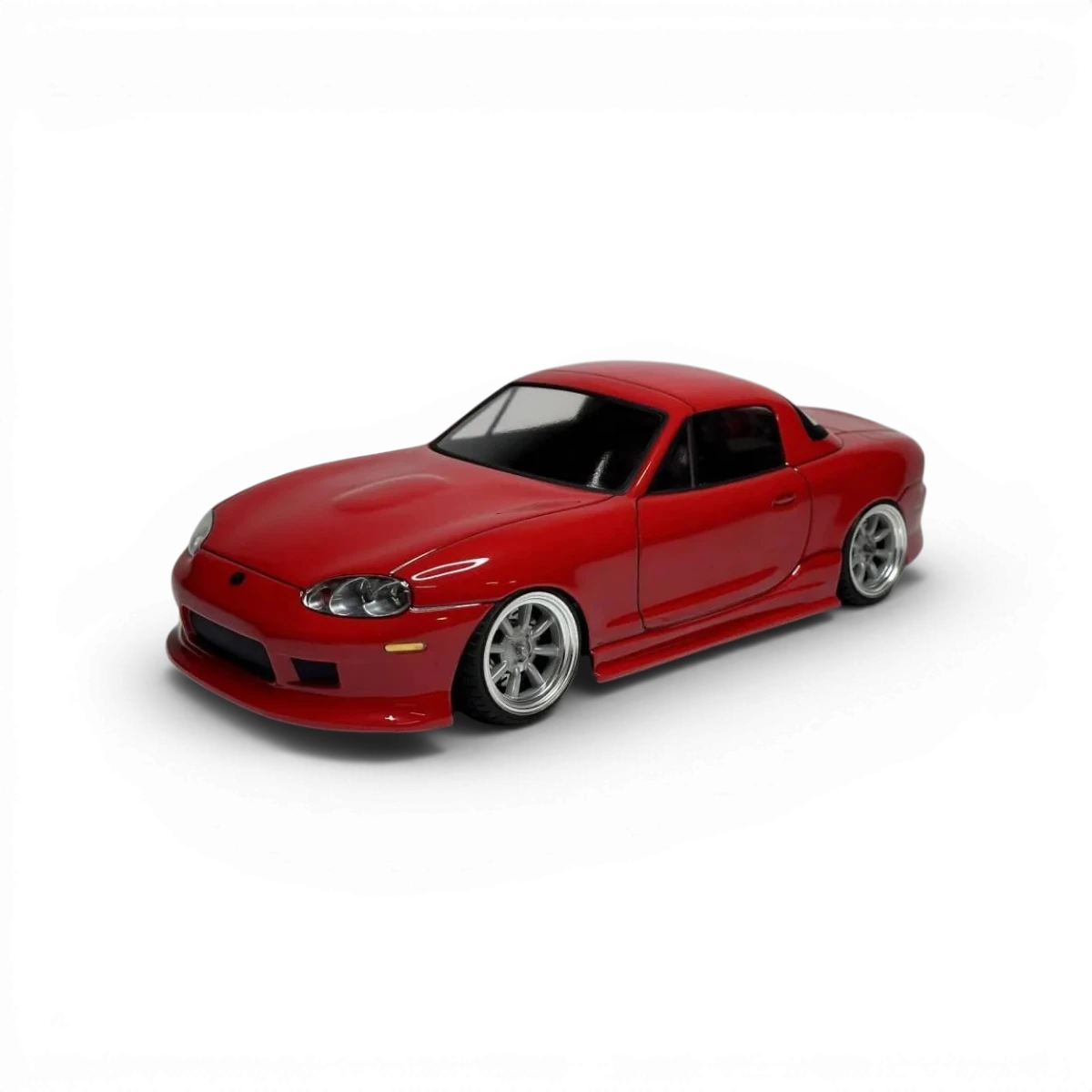 Carrosserie pour Mazda MX5 NB de la marque Aplastics RC, vue détaillée de la carrosserie en plastique pour modèle réduit.