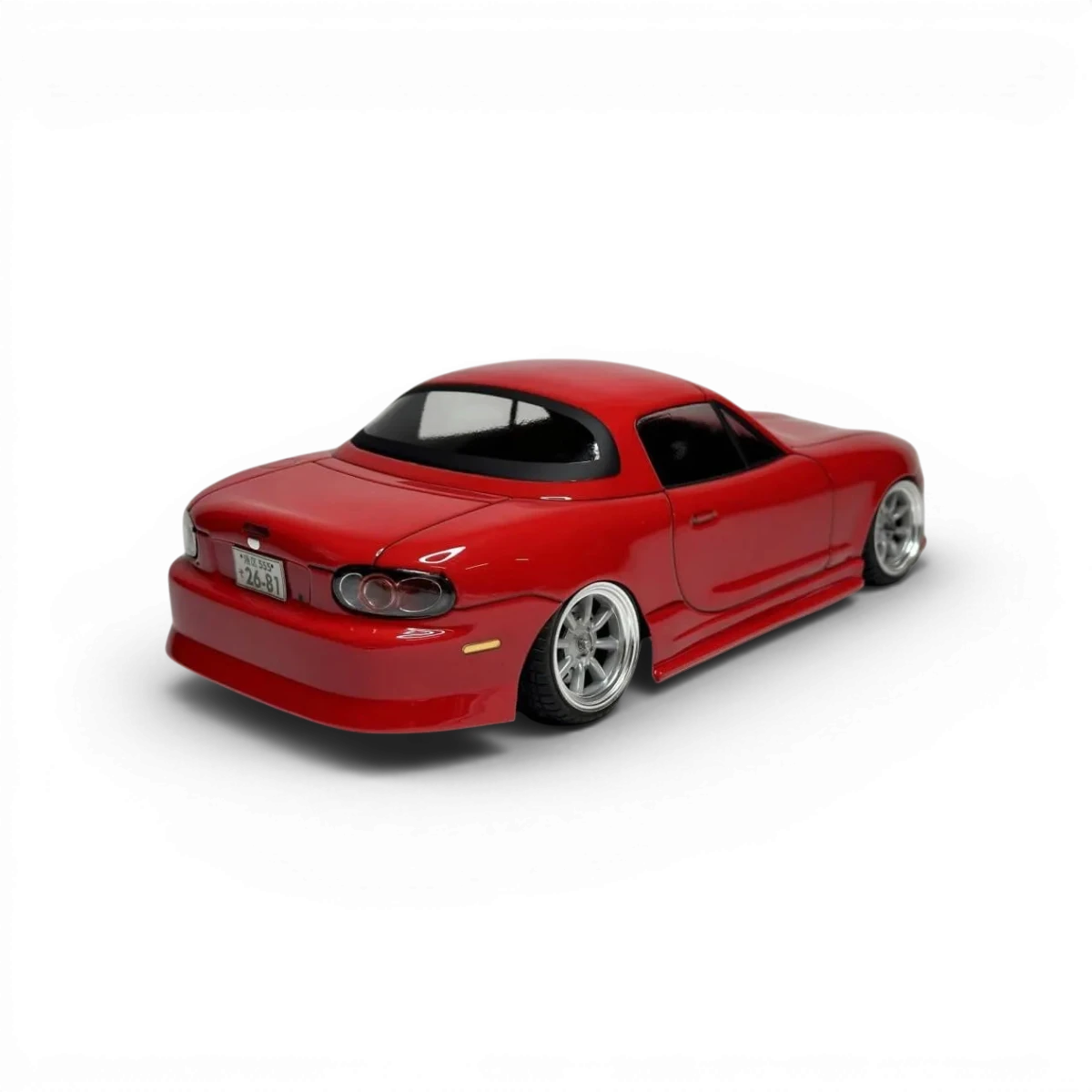 Carrosserie de voiture Mazda MX5 NB en plastique par Aplastics RC, vue de face avec détails de la carrosserie.