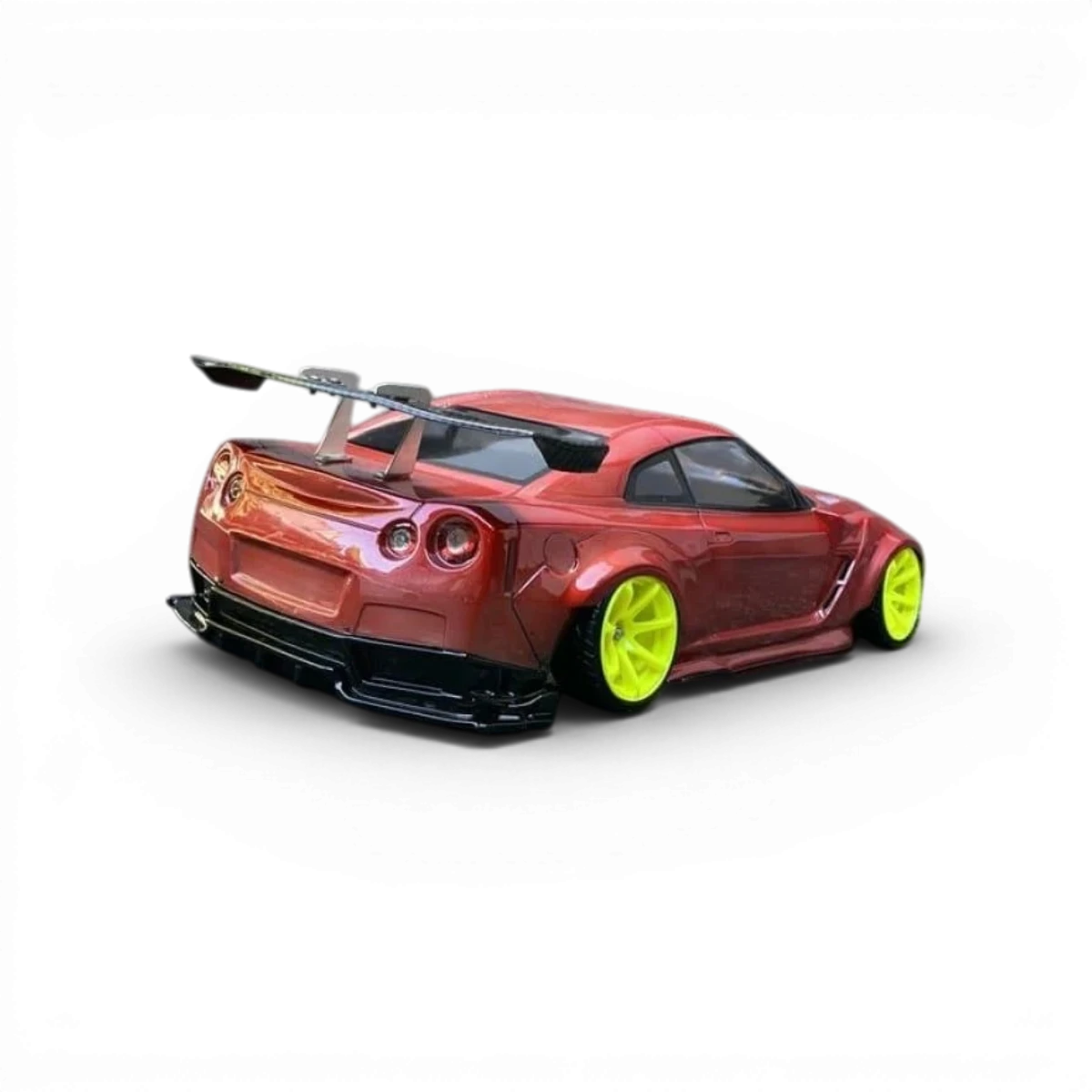 Carrosserie de Nissan GTR R35 BLS de Pandora RC, détail réaliste en plastique noir avec finitions précises.