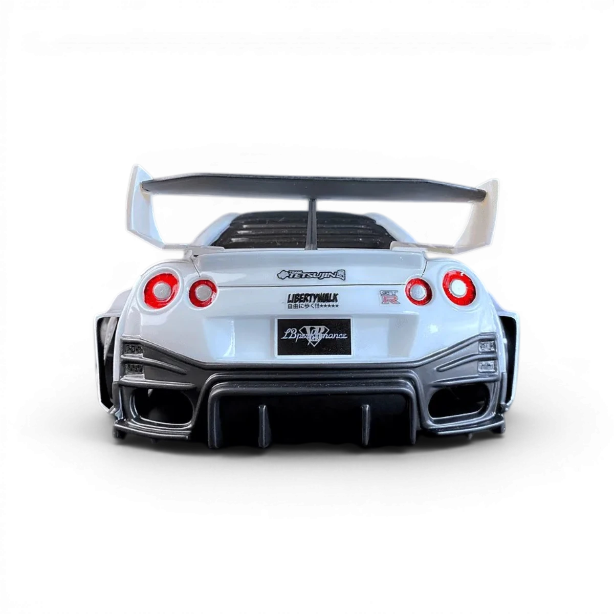 Silhouette de voiture Nissan GTR Tetsujin, carrosserie en noir, vue de côté avec détails du design élégant et dynamique.