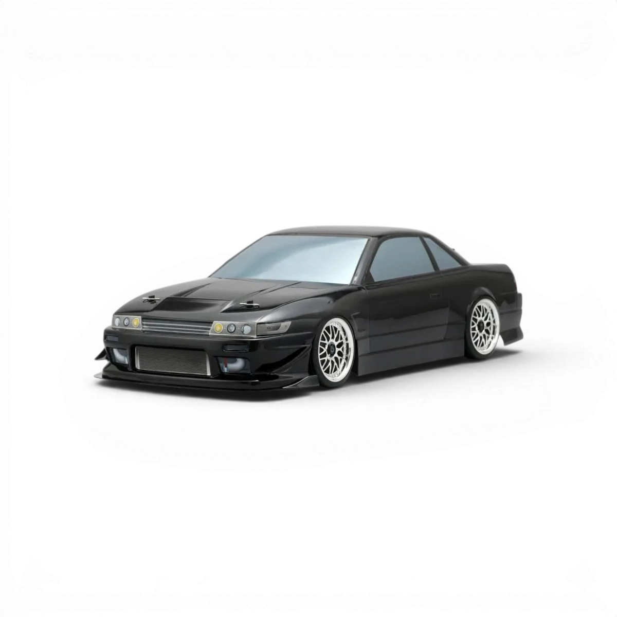 Carrosserie Nissan PS13 Silvia XTREME de Team Yokomo, design détaillé pour voiture RC, finition précise et style réaliste.