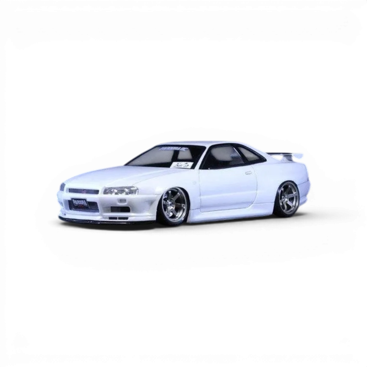 Modèle de voiture radiocommandée Nissan Skyline R34 GT-R V-spec II de Pandora RC, carrosserie détaillée et réaliste.