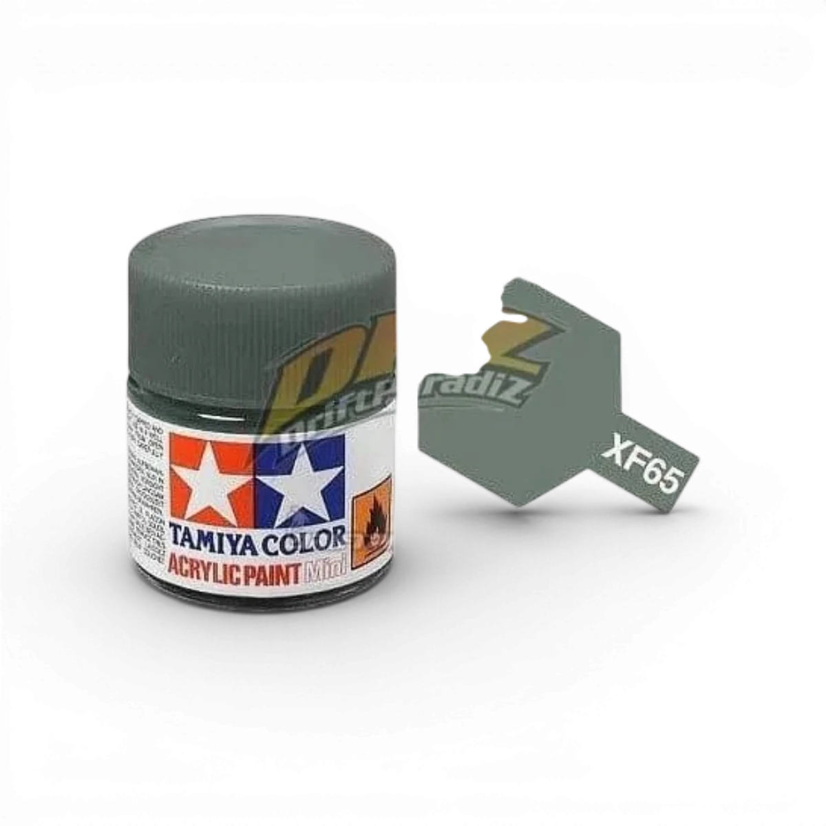 Peinture Tamiya XF65 Gris Campagne Mat pour modélisme, pot de peinture en gros plan, surface peinte visible.