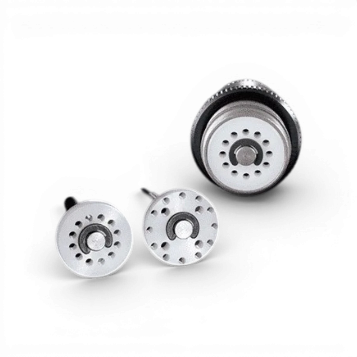 Pistons Revoshock II à 16 trous de la marque Team Axon, pièces détachées pour suspension, visibles avec détails techniques.