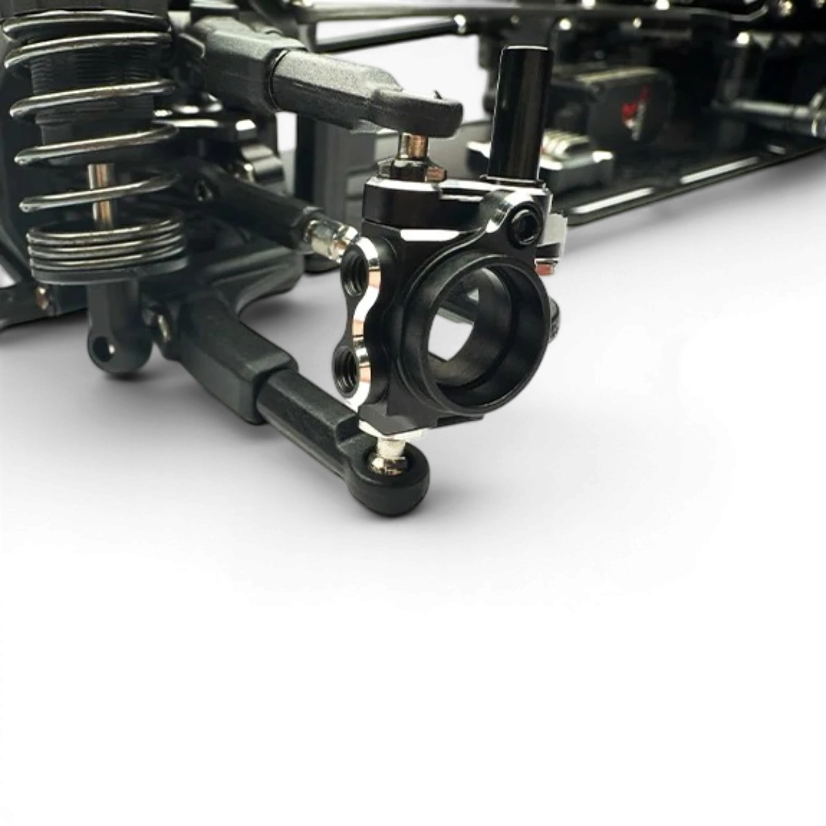Porte-fusée avant Multi-Select 2.0 mm pour RDX, pièce détachée de voiture RC Team Reve D, visible en vue rapprochée.