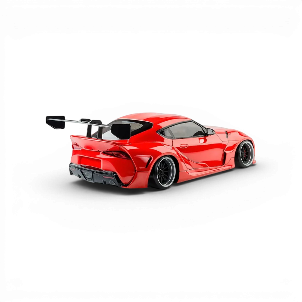 Voiture RC drift Max Speed Technology RMX 2.5 RTR Toyota Supra A90 rouge, avec détails du modèle et design réaliste.