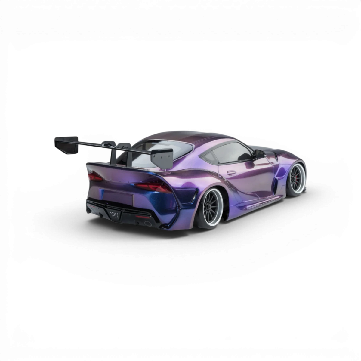 Voiture RC Drift Max Speed Technology RMX 2.5 RTR Toyota Supra A90 violette iridescente, vue de côté sur fond blanc.