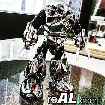 Chaussures de sport ReAL Krome Show UP en cuir noir avec semelle blanche, vue de profil.