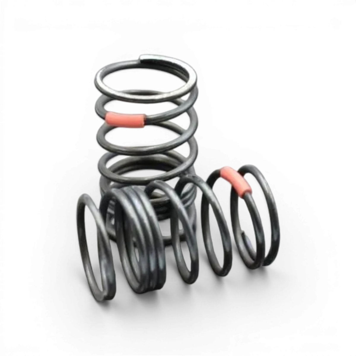 Ressorts arrière R-tune Hard de Team Reve D, pièces détachées pour suspension, visible sur l'image.