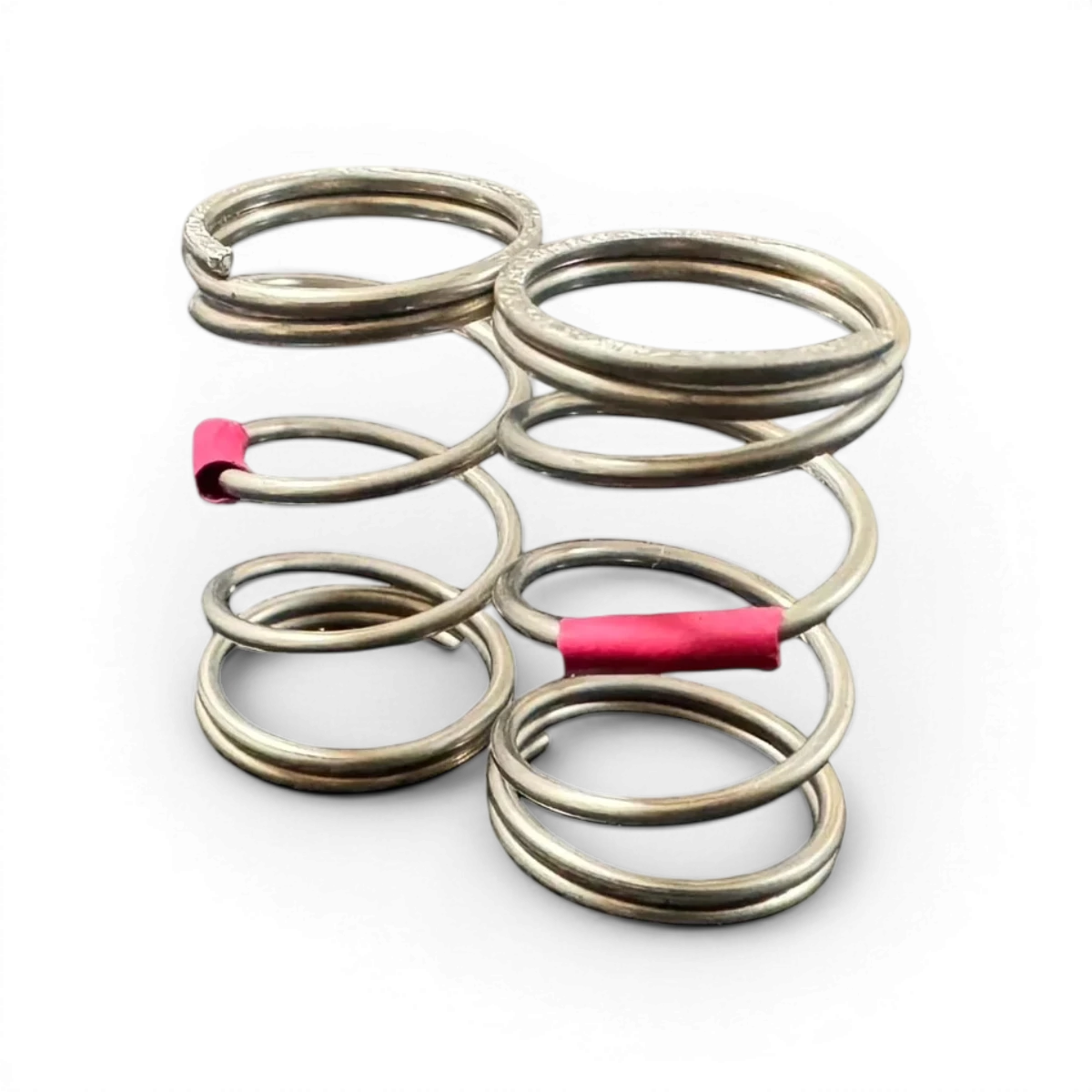 Ressorts AST 27 dur, marque Topline, en métal robuste, avec spirales épaisses pour une suspension solide et durable.