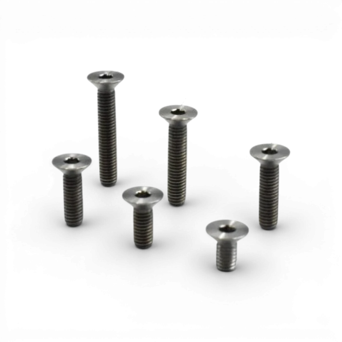 Vis titanes tête plates 3x15 de Team Reve D, pièce détachée pour vélo, groupée en lot de 4 pièces.
