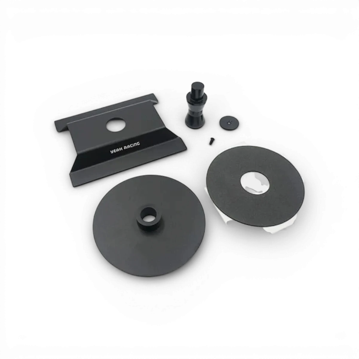 Support tournant Yeah Racing, en plastique noir avec plate-forme tournante pour maintenir et faire tourner des objets ou modèles.