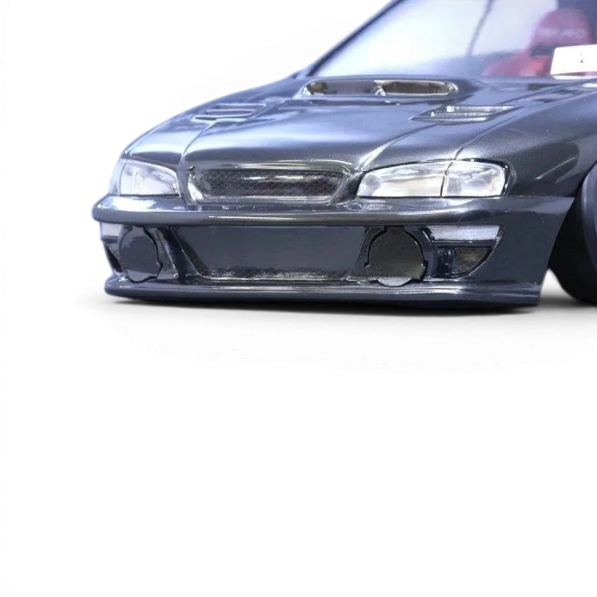 Carrosserie Subaru Impreza 22B-STI Pandora RC, modèle réduit détaillé, en plastique avec peinture bleue et logo Subaru visible.