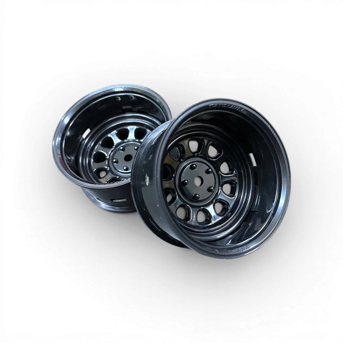 Roues Tetsujin Sunflower noir/noir pour skateboard, design moderne avec motif floral noir, vue de face.