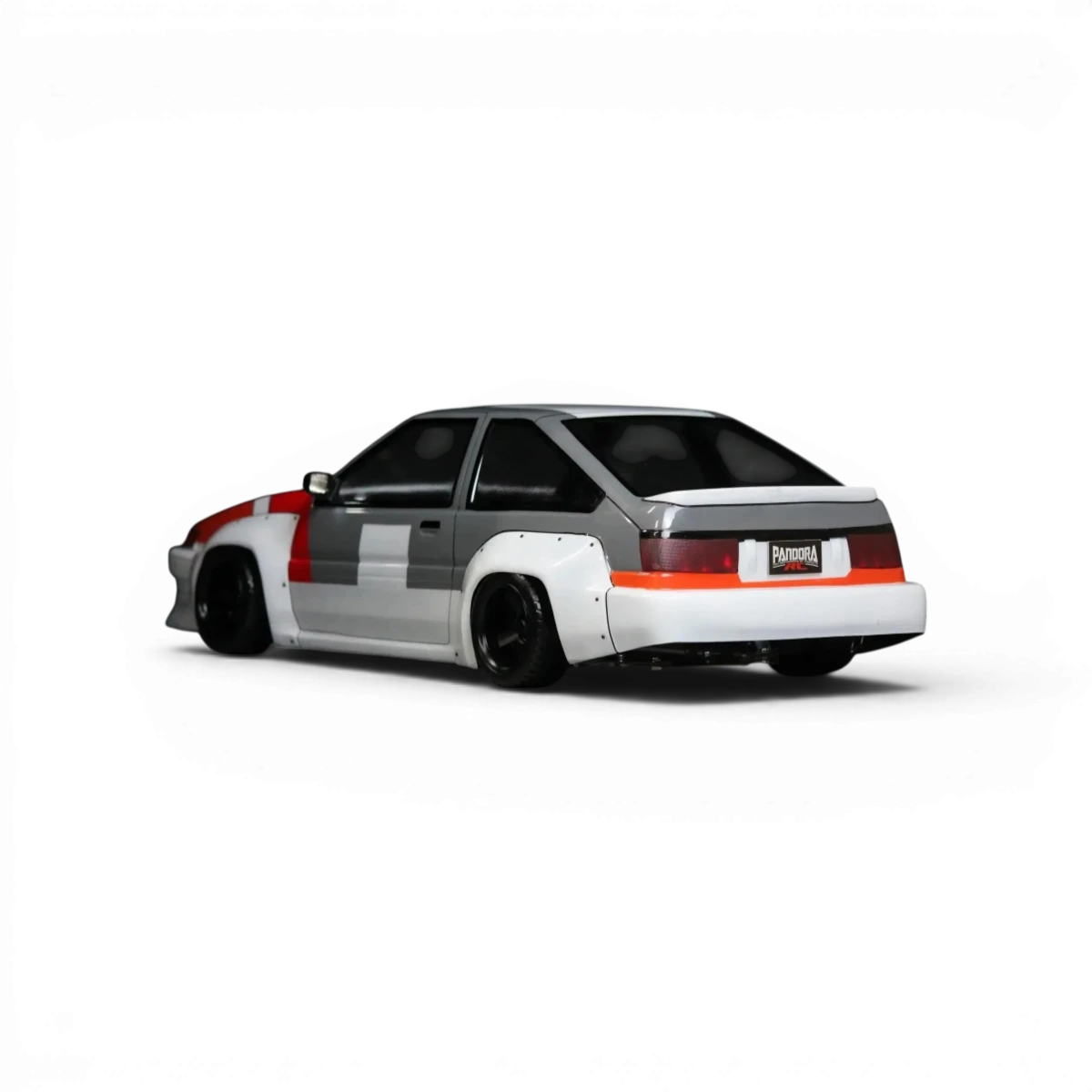 Carrosserie de voiture Toyota AE86 Trueno N2 de Pandora RC, détail en plastique avec finition précise et logo de la marque.