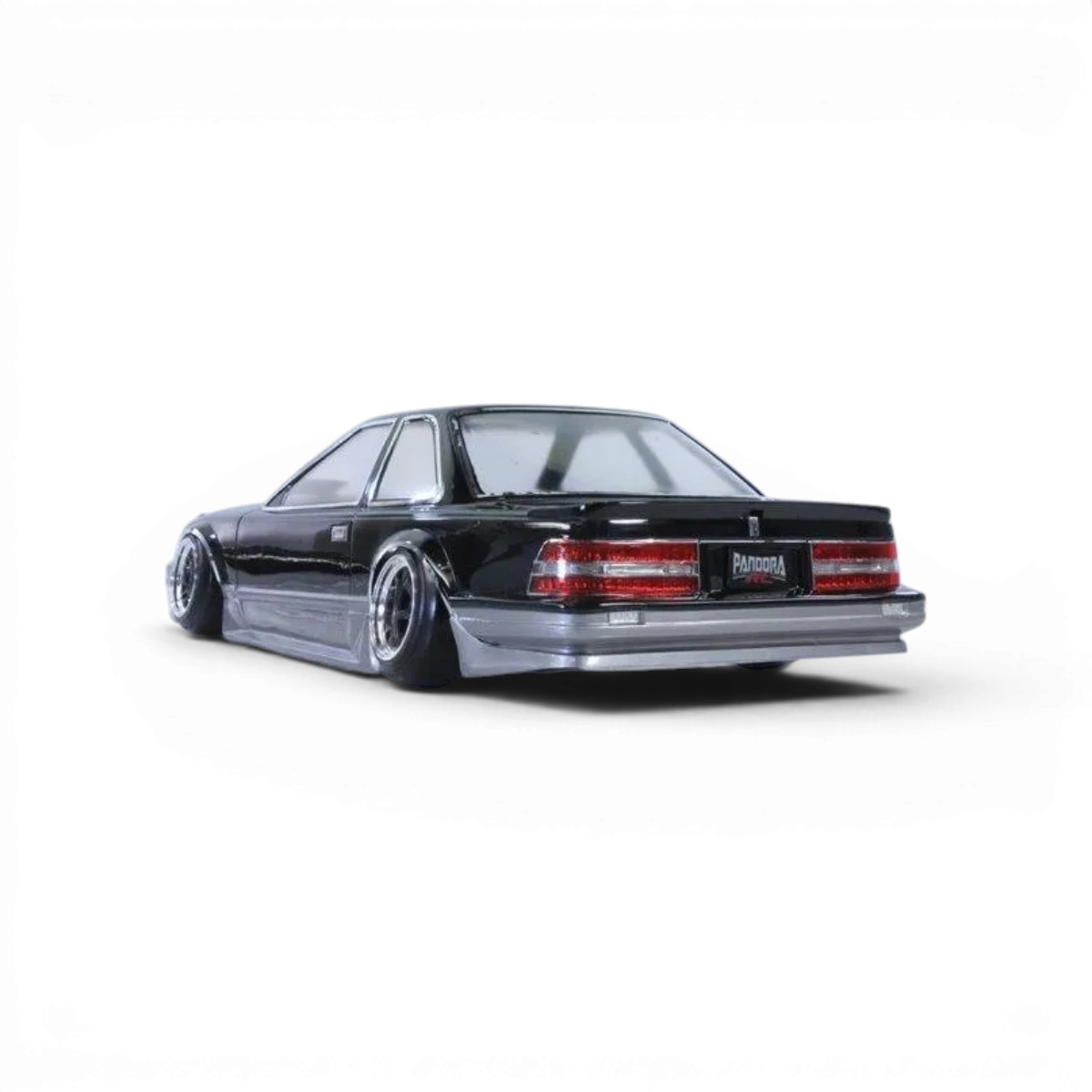 Carrosserie de voiture Toyota Soarer Z20 de Pandora RC, détail en plastique avec finition réaliste, vue de face.