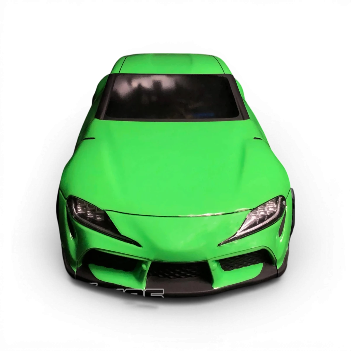 Carrosserie de voiture Toyota Supra A90 en plastique pour modèle réduit, par Aplastics RC, vue détaillée et bien éclairée.