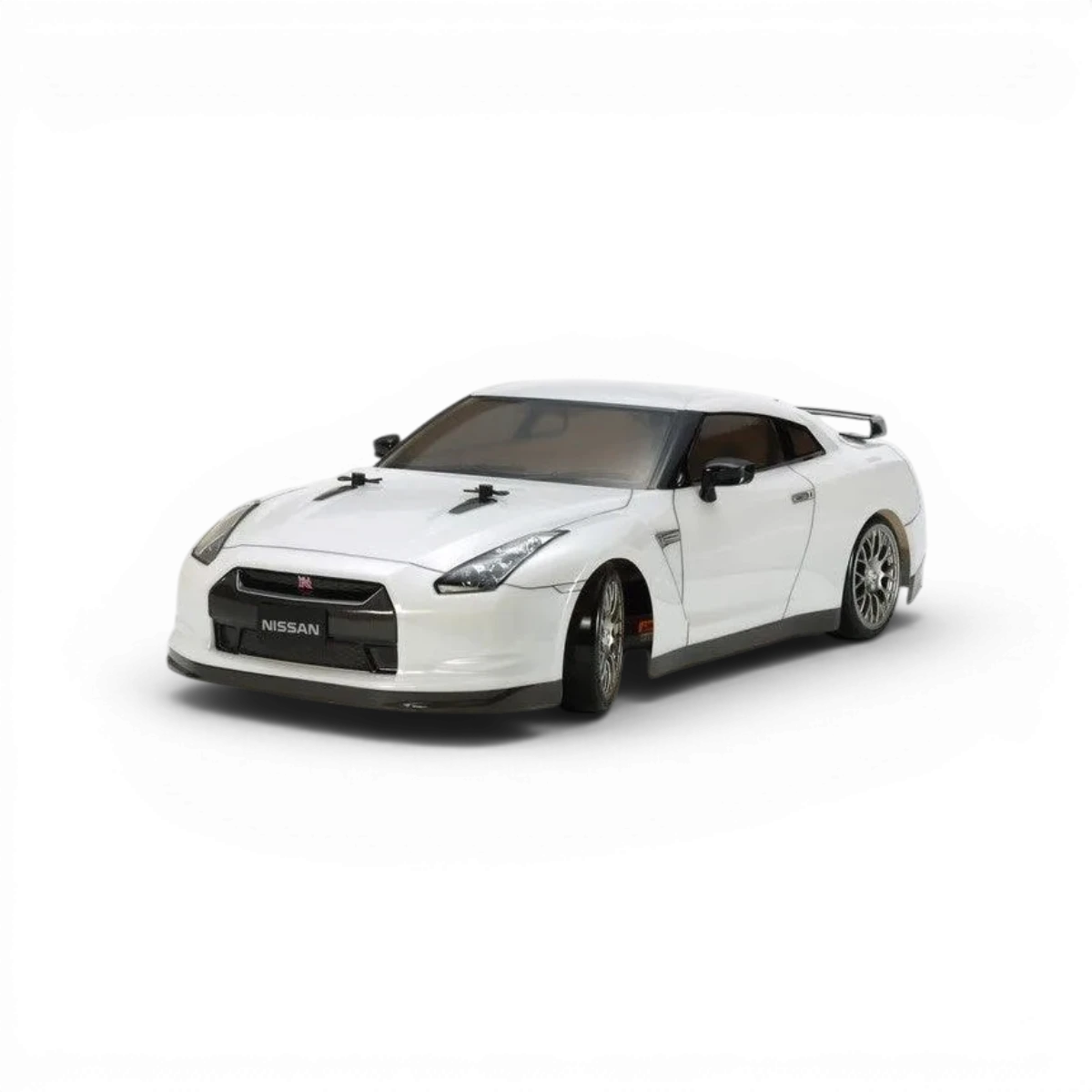 Kit Tamiya TT-02D Nissan GT-R Drift Spec avec carrosserie et pièces pour modèle réduit de voiture de drift.