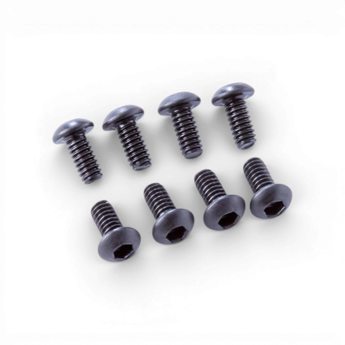 Vis M2×4 mm à tête bombée pour pièces détachées RC, marque Team Reve D, visible en détail sur l'image.